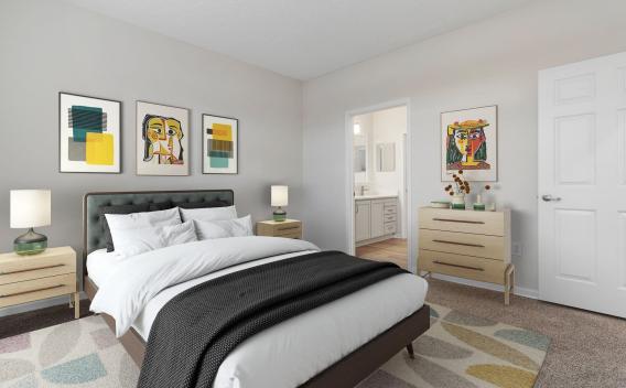 Modern bedroom with a dark bed, white bedding, nightstands, abstract art, light wood dresser, and a colorful rug. Bathroom entry visible.